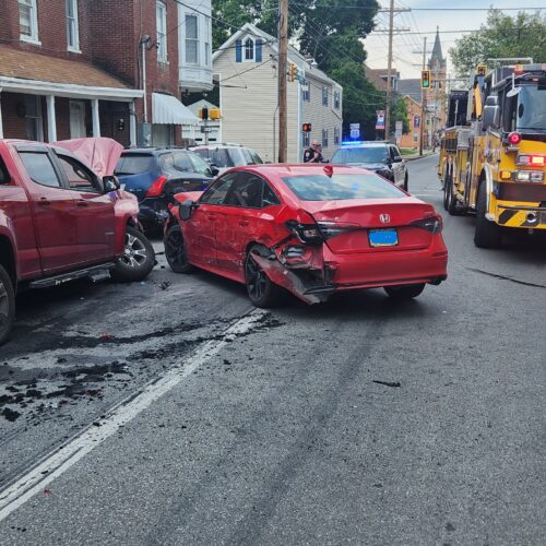 Vehicle accident with entrapment and fire closes South Second St.